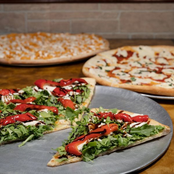 Multiple pizza pies